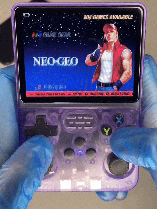 Retro gaming handheld device displaying NEOGEO games selection, with user wearing blue gloves.